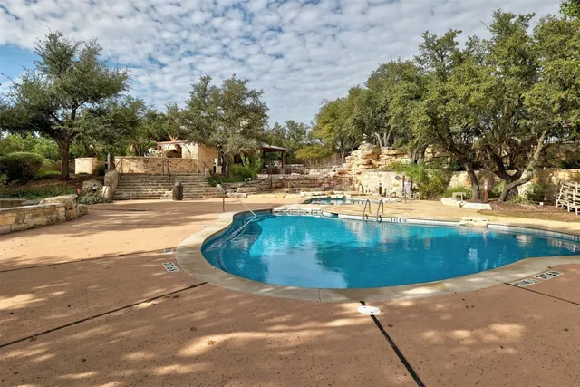 a view of a yard with trees
