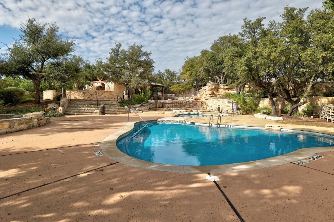 17800 Edgewood Way, Unit 202 Jonestown, TX 78645 - Photo 32 of 40 a view of a yard with trees