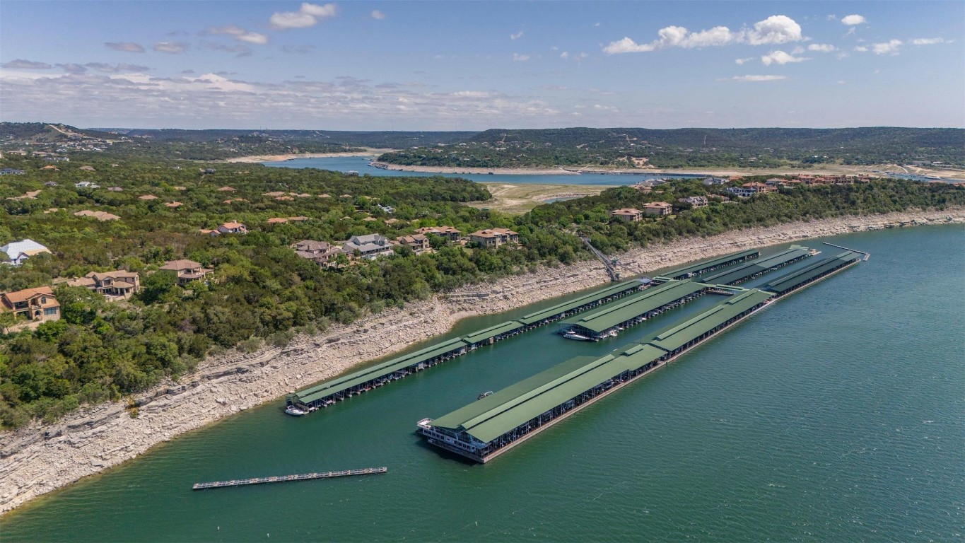 17800 Edgewood Way, Unit 202 Jonestown, TX 78645 - Photo 40 of 40 a view of a lake with a mountain