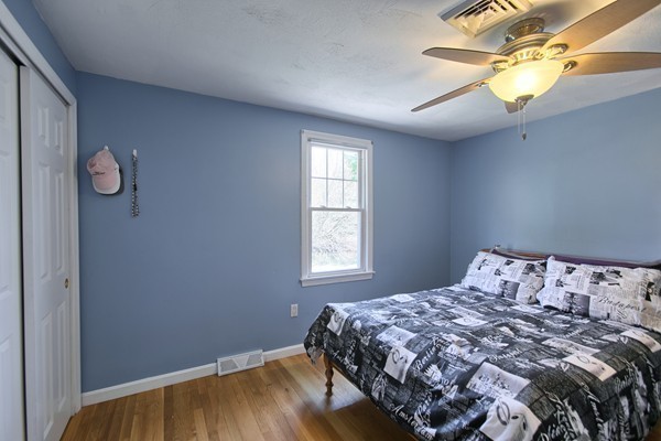 4 Snowberry Road Andover, MA 01810 - Photo 20 of 30 a bedroom with a bed and a window