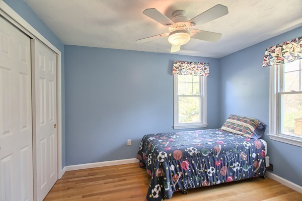 4 Snowberry Road Andover, MA 01810 - Photo 22 of 30 a bedroom with a bed and a window