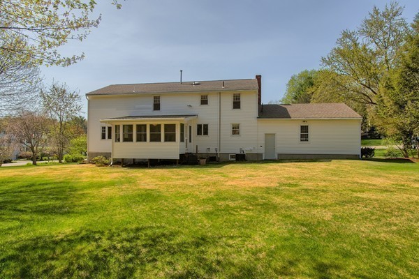 4 Snowberry Road Andover, MA 01810 - Photo 25 of 30 a view of a large pool with an outdoor space and seating area