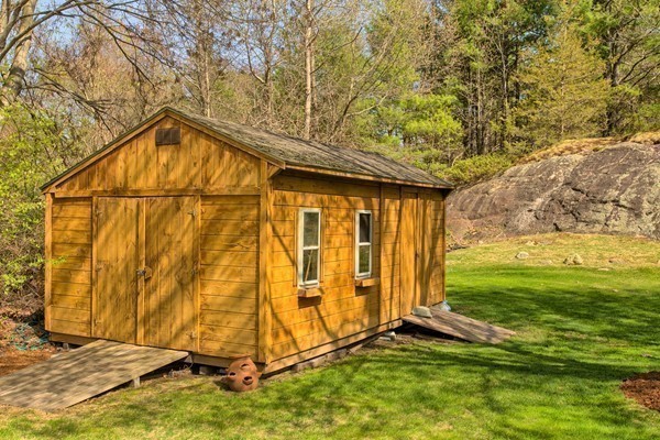 4 Snowberry Road Andover, MA 01810 - Photo 27 of 30 a view of outdoor space with deck and backyard