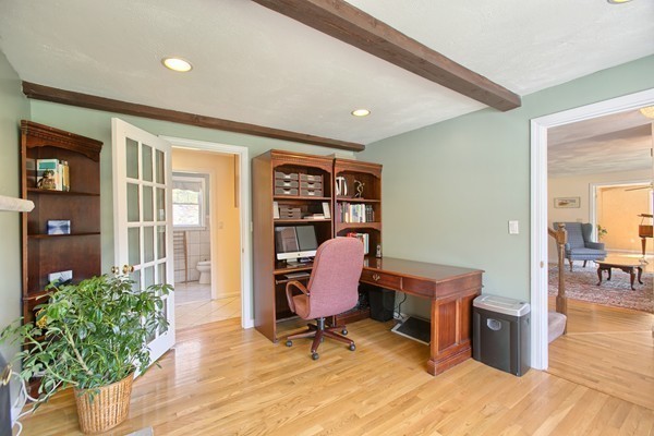4 Snowberry Road Andover, MA 01810 - Photo 9 of 30 a view of a workspace with furniture and lounge chair