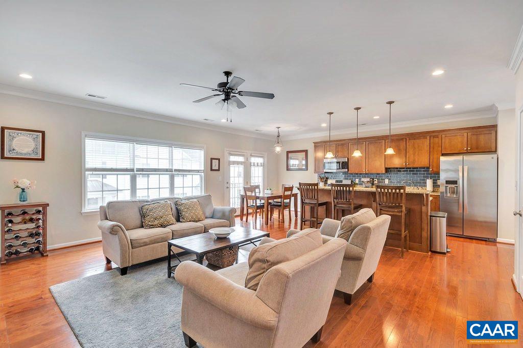 341 Quarry Road Charlottesville, VA 22902 - Photo 1 of 19 a living room with furniture and a large window