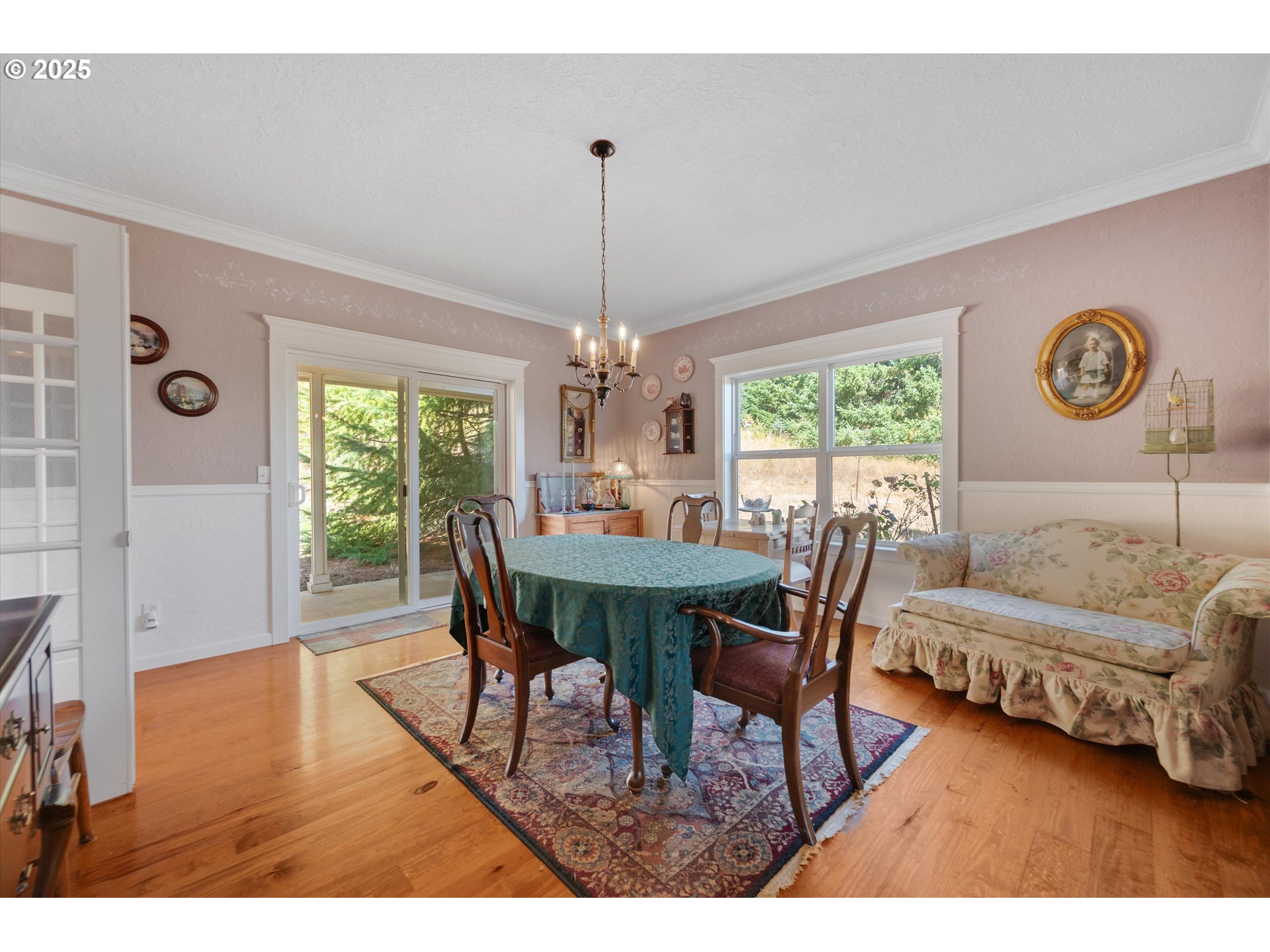 2965 Mistletoe Road Dallas, OR 97338 - Photo 14 of 43 a view of a dining room with furniture window and outside view
