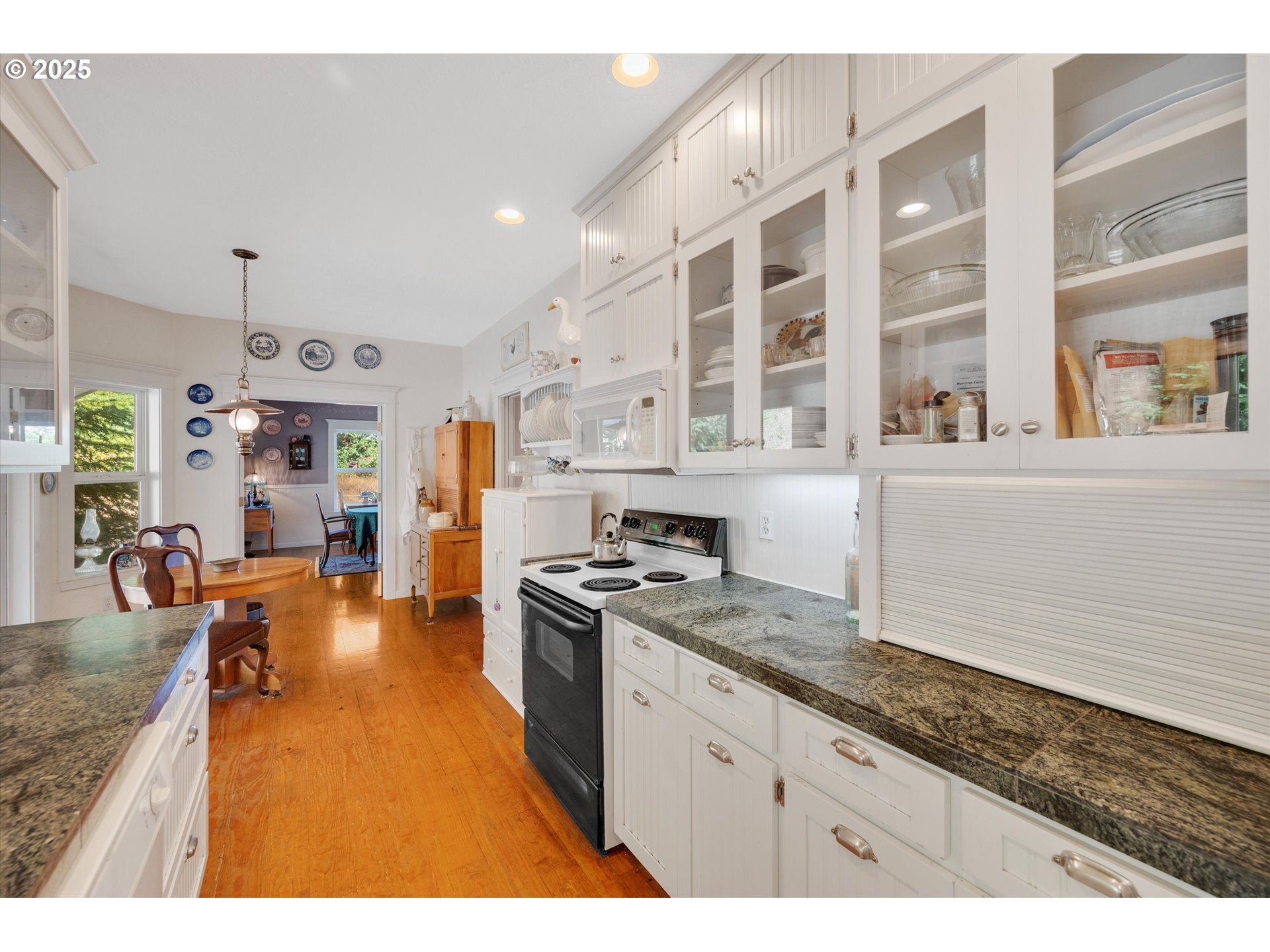 2965 Mistletoe Road Dallas, OR 97338 - Photo 24 of 43 a kitchen with stainless steel appliances granite countertop a stove and a sink
