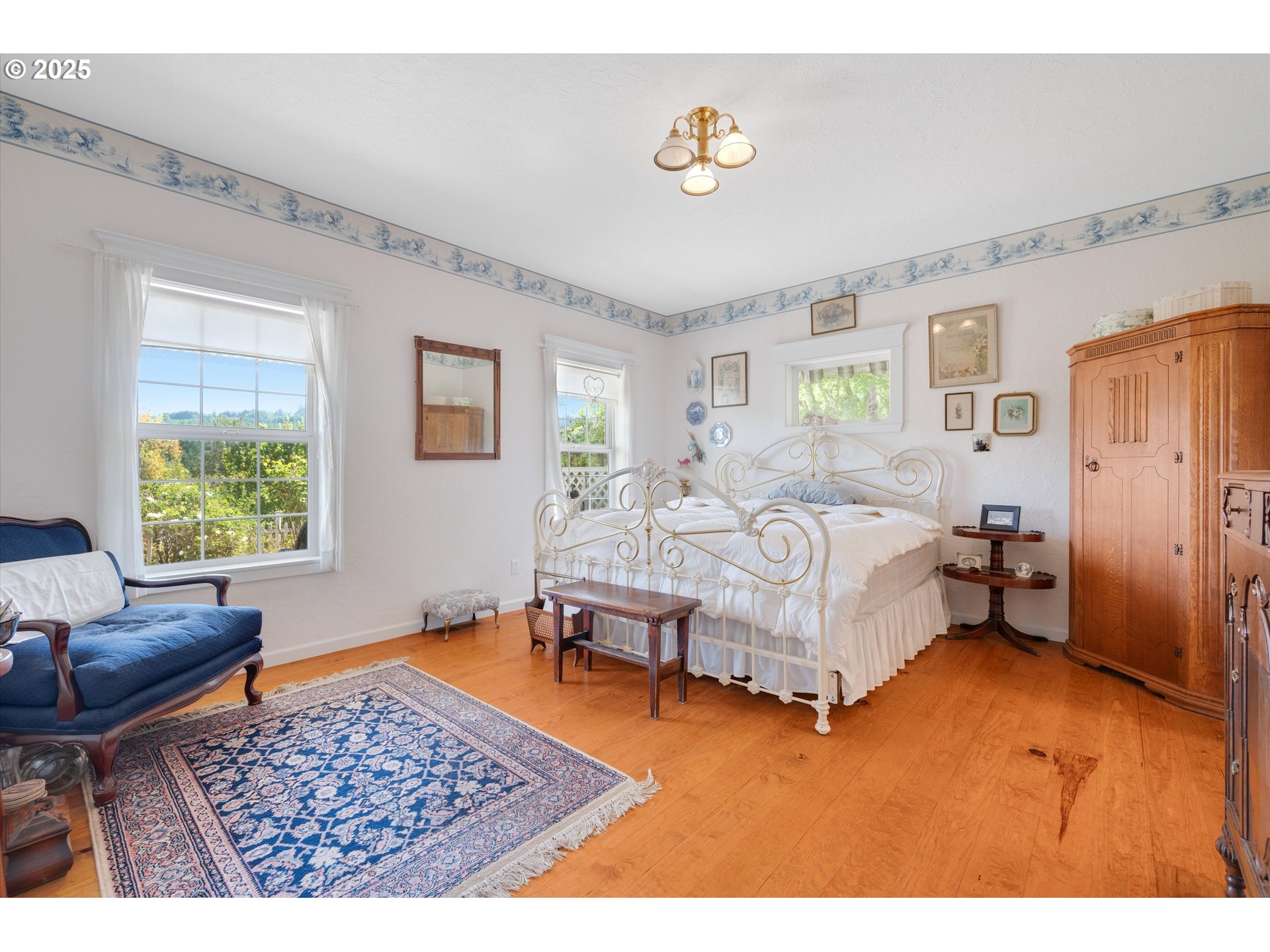 2965 Mistletoe Road Dallas, OR 97338 - Photo 27 of 43 a bedroom with a bed and a couch
