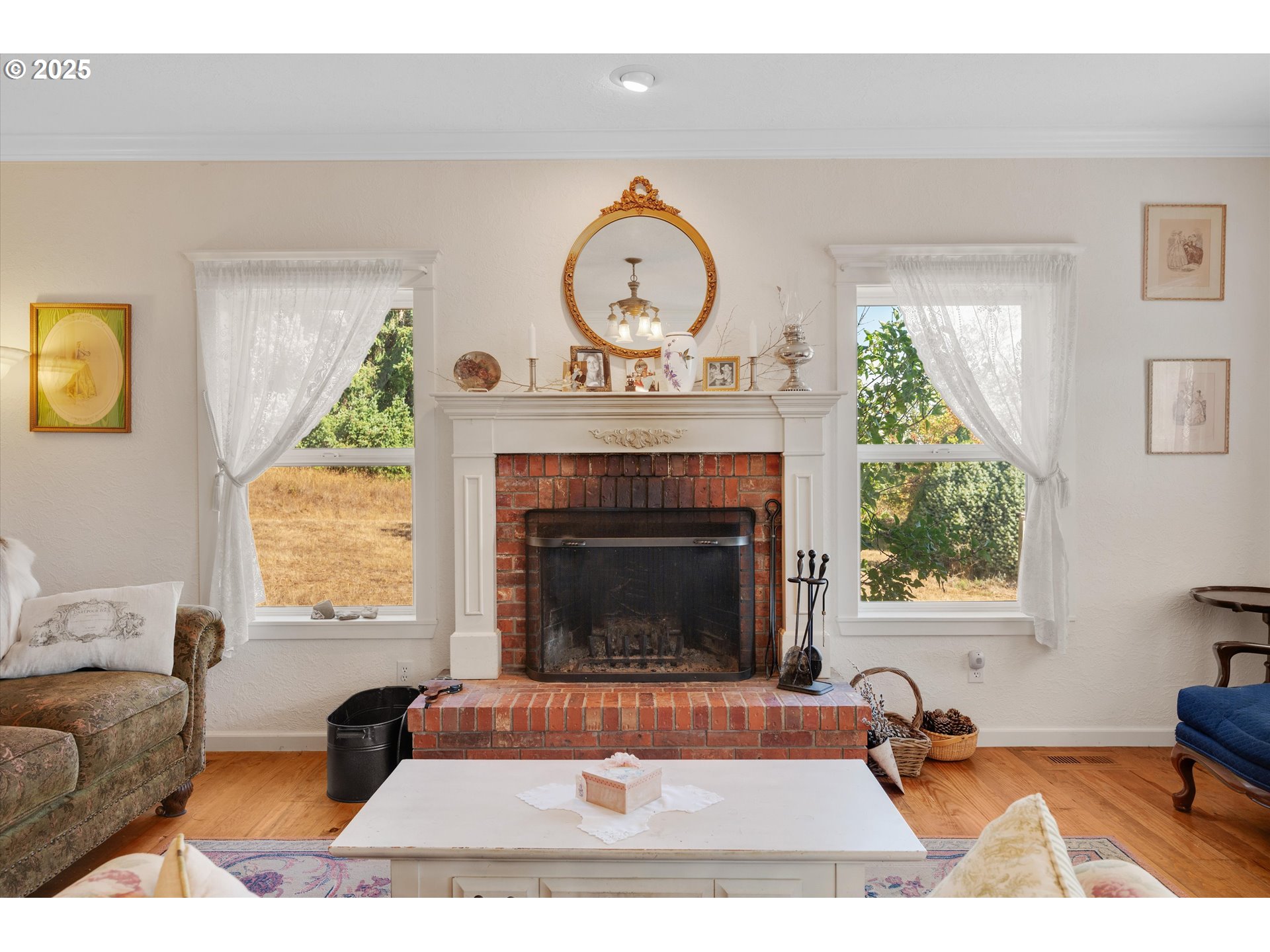 2965 Mistletoe Road Dallas, OR 97338 - Photo 9 of 43 a living room with furniture a fireplace and a window