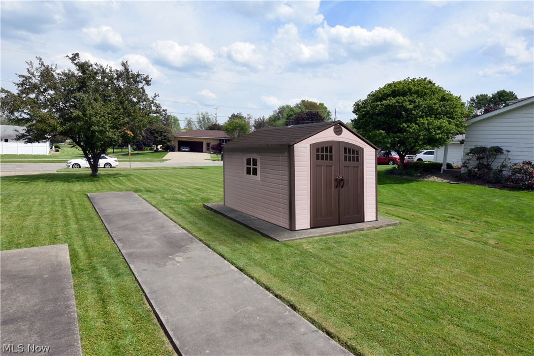 2850 Reeves Road Northeast Warren, OH 44483 - Photo 29 of 31 Cement Pad is ready for a possible Man Cave or Green Thumb Green House! (shed is not included)