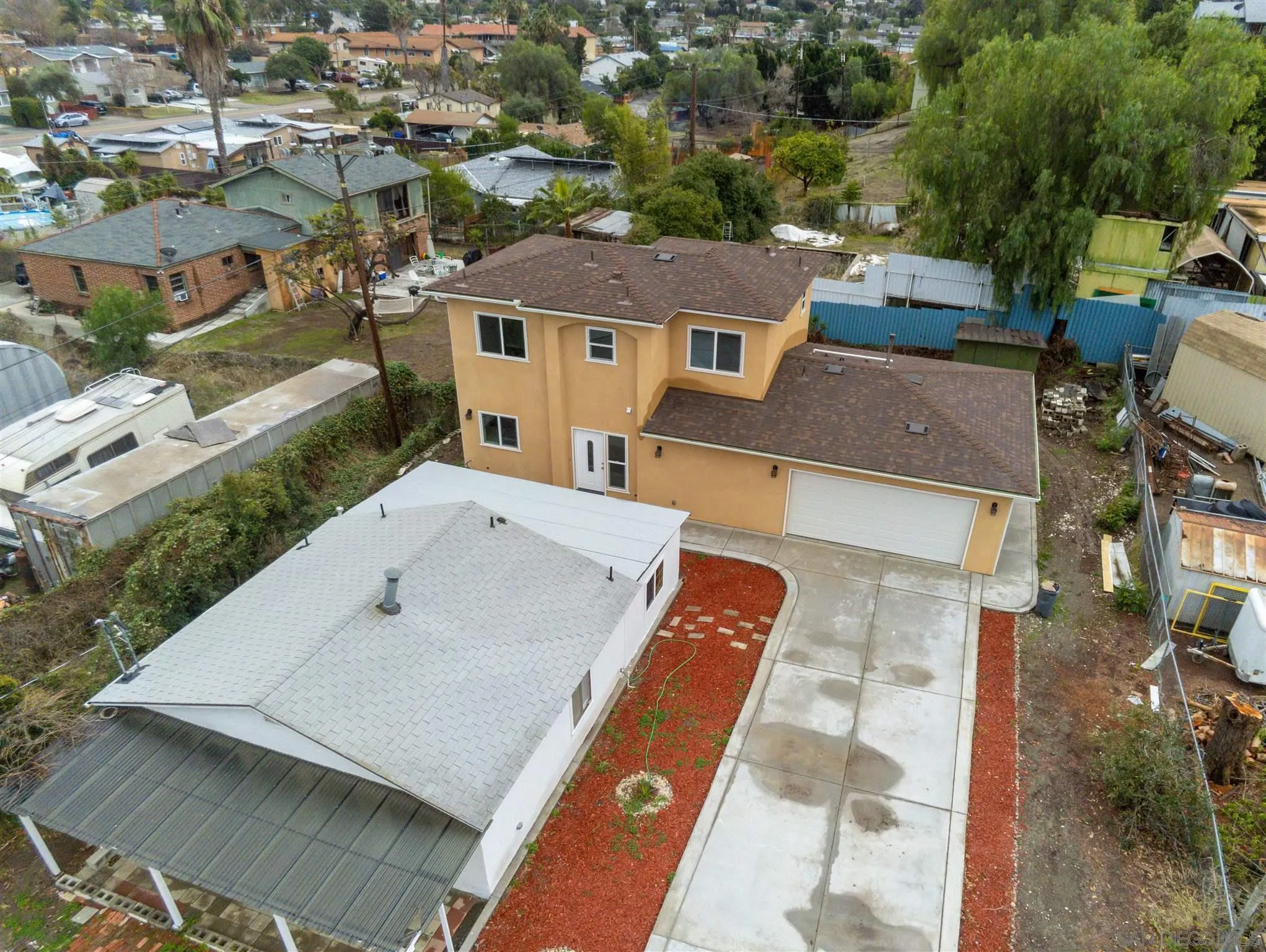 9957 Sierra Madre Road Spring Valley, CA 91977 - Photo 1 of 46 an aerial view of a house with a yard