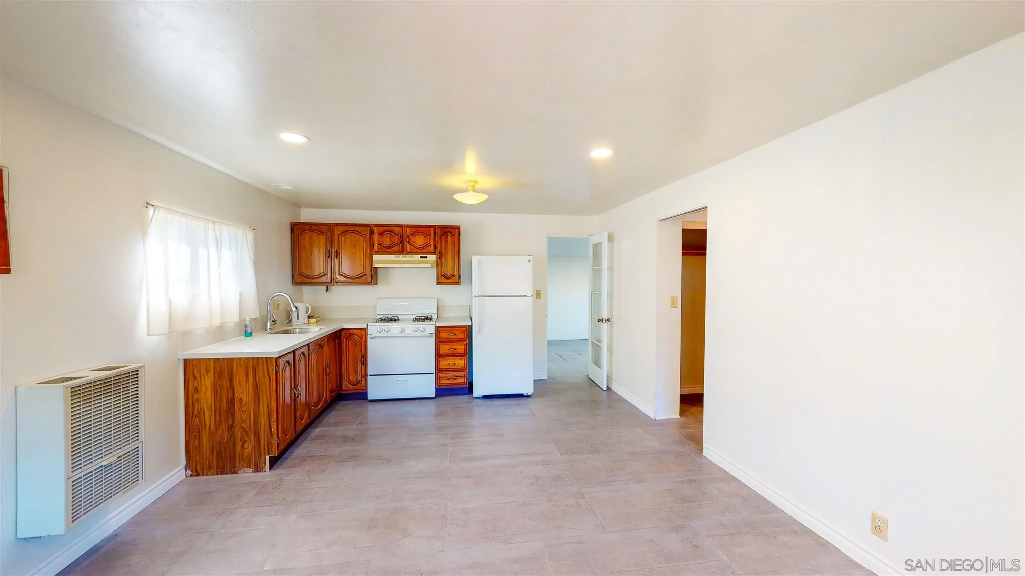9957 Sierra Madre Road Spring Valley, CA 91977 - Photo 44 of 46 a view of a kitchen with large windows