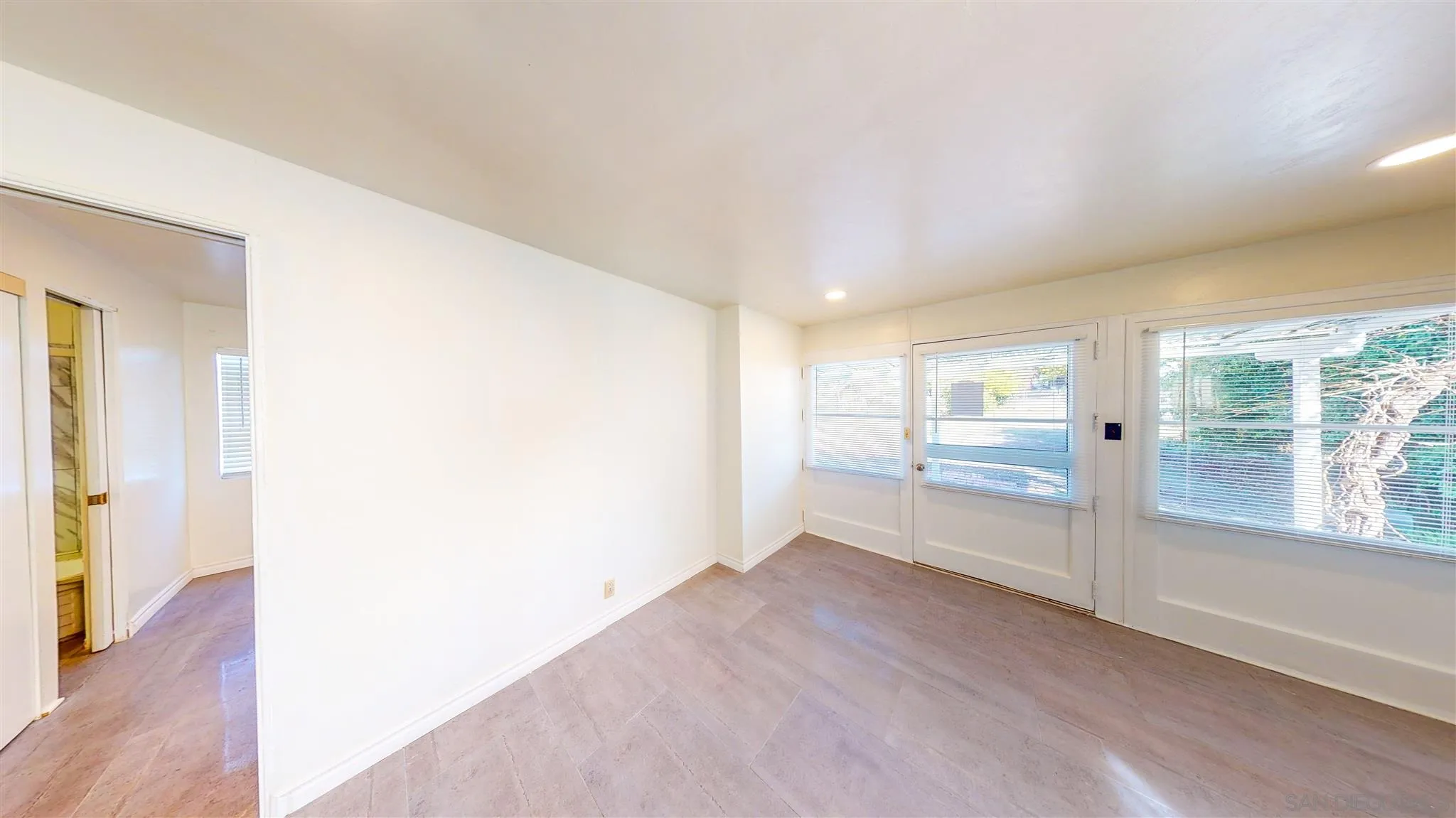 9957 Sierra Madre Road Spring Valley, CA 91977 - Photo 45 of 46 a view of empty room with wooden floor