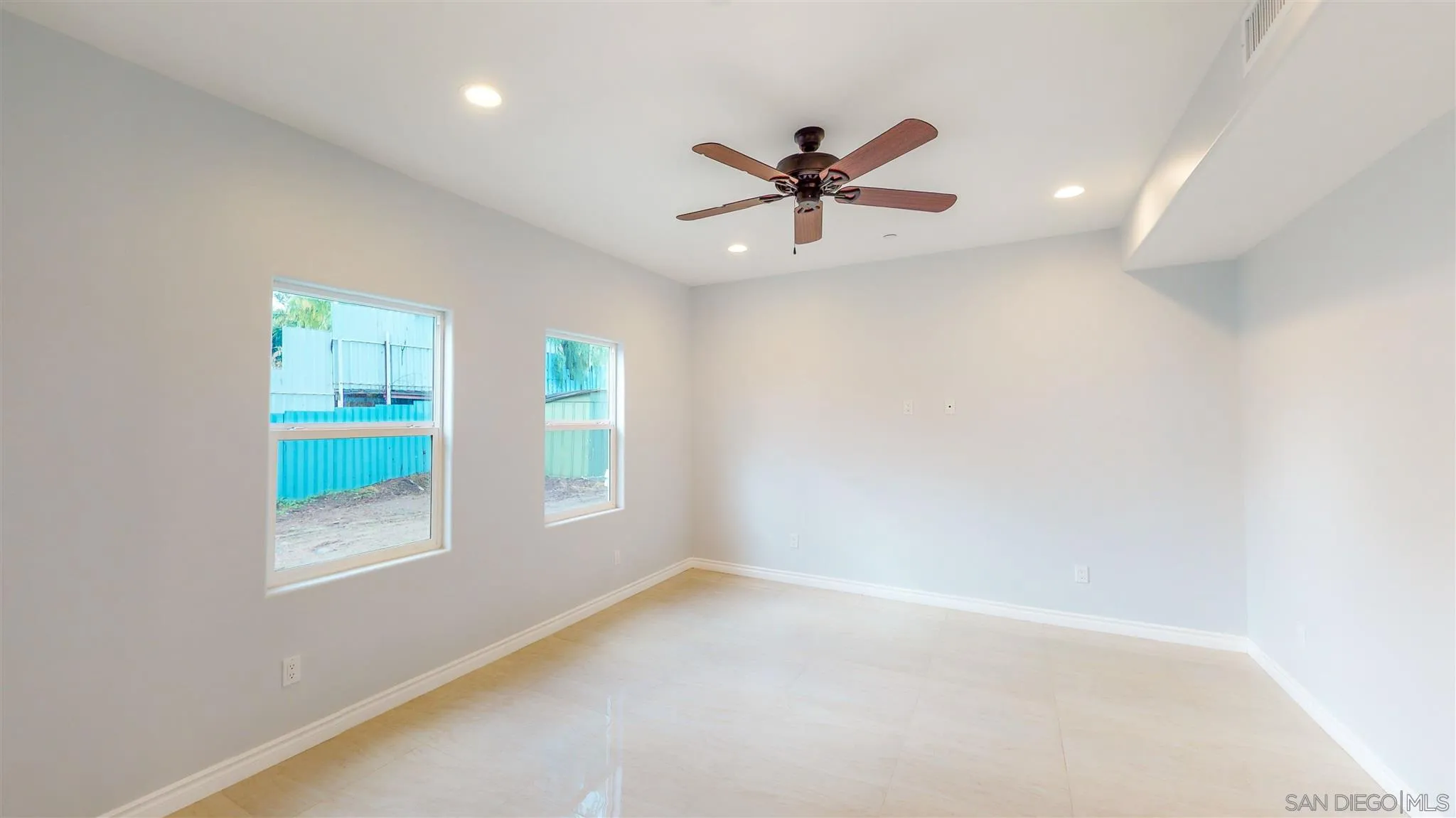 9957 Sierra Madre Road Spring Valley, CA 91977 - Photo 6 of 46 a view of an empty room and window