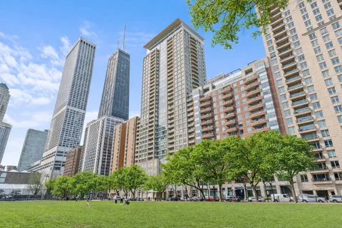 a view of a building with a yard