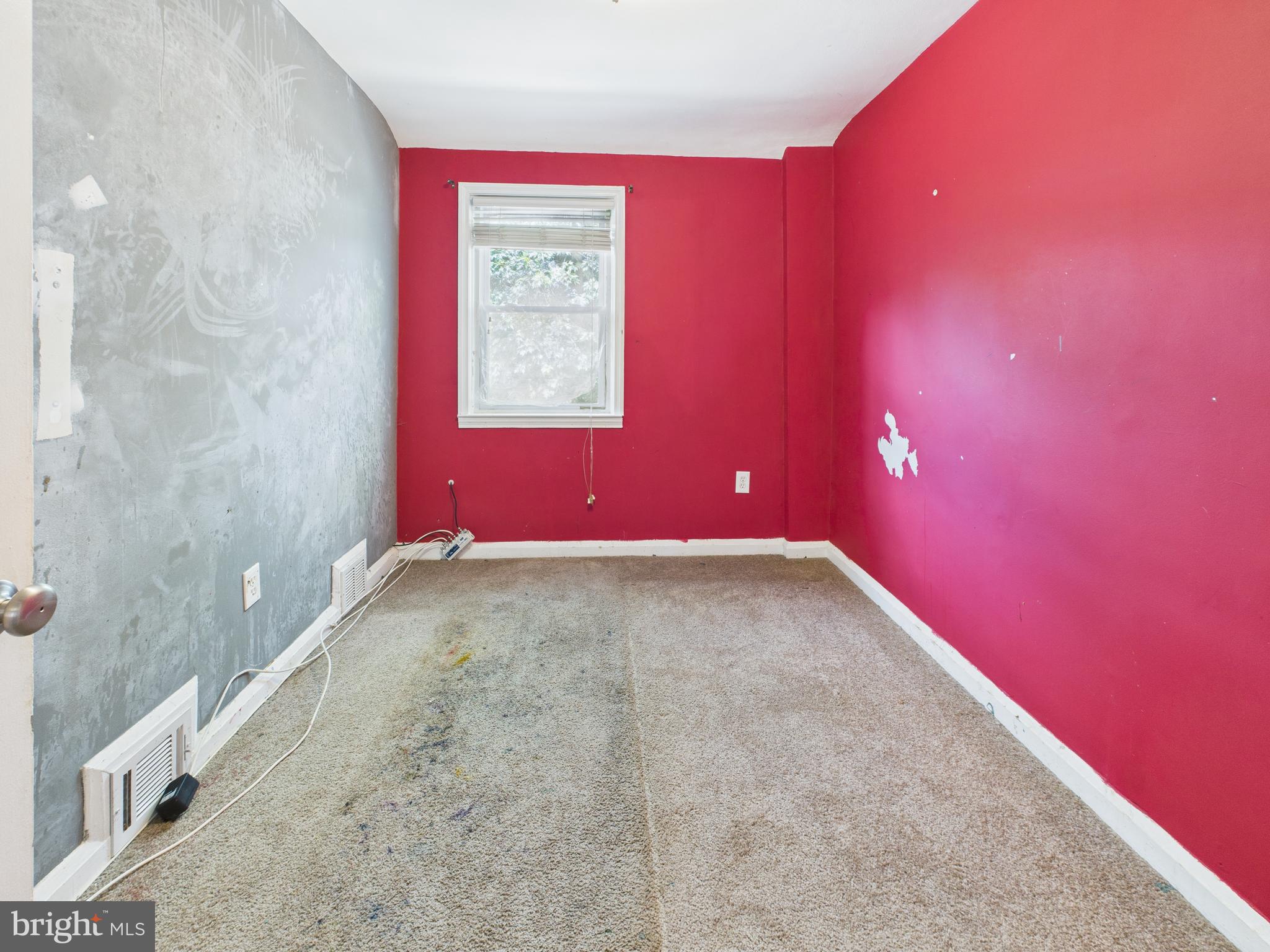1206 Cedarcroft Road Baltimore, MD 21239 - Photo 11 of 29 an empty room with windows