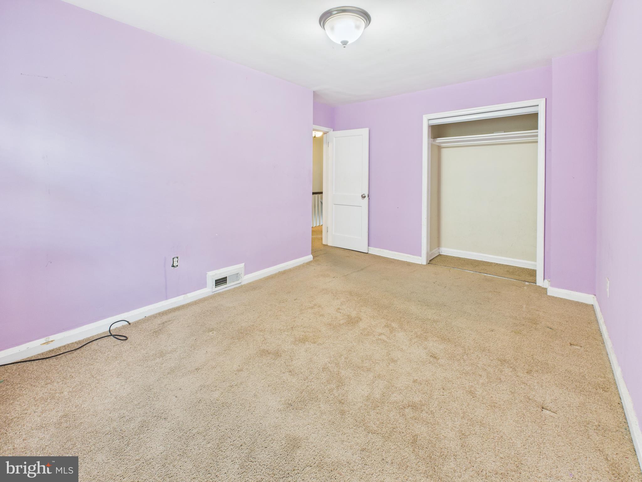 1206 Cedarcroft Road Baltimore, MD 21239 - Photo 12 of 29 an empty room with an entryway