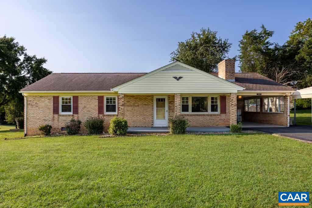 144 Dairy Road Ruckersville, VA 22968 - Photo 1 of 33 a front view of a house with a yard