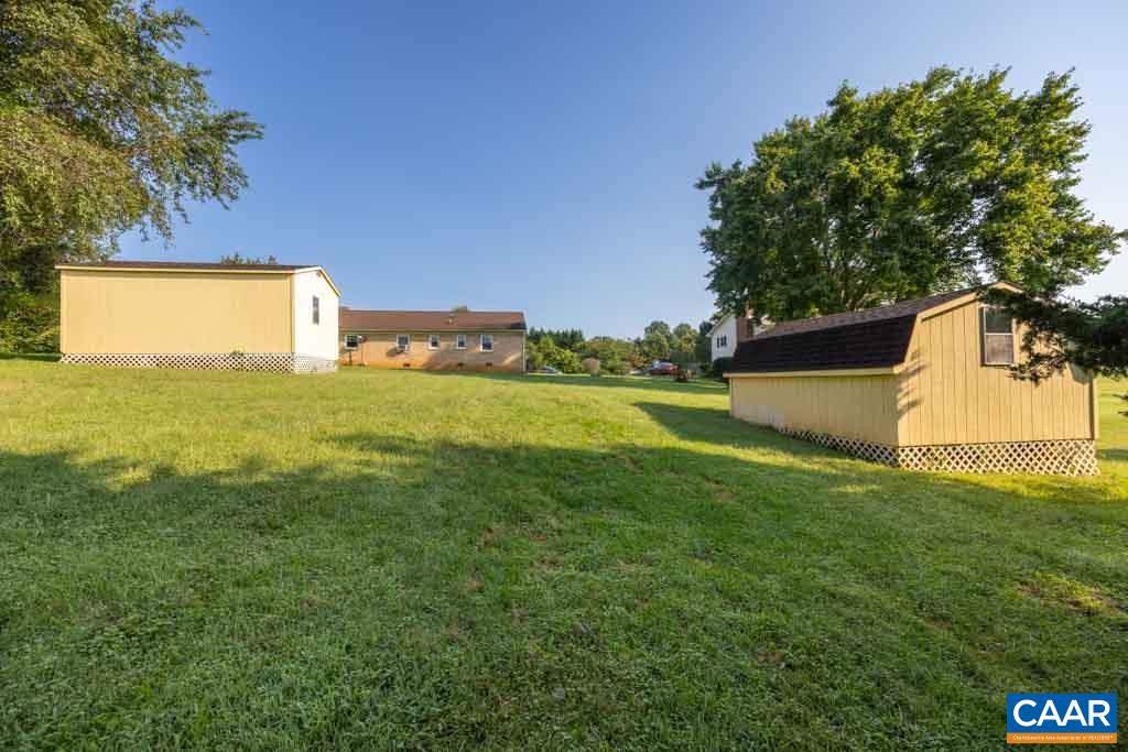 144 Dairy Road Ruckersville, VA 22968 - Photo 12 of 33 a view of a yard with a house in the background