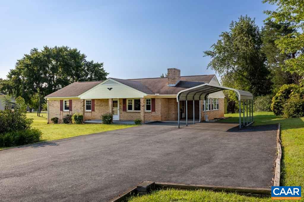 144 Dairy Road Ruckersville, VA 22968 - Photo 2 of 33 a front view of a house with a yard and porch