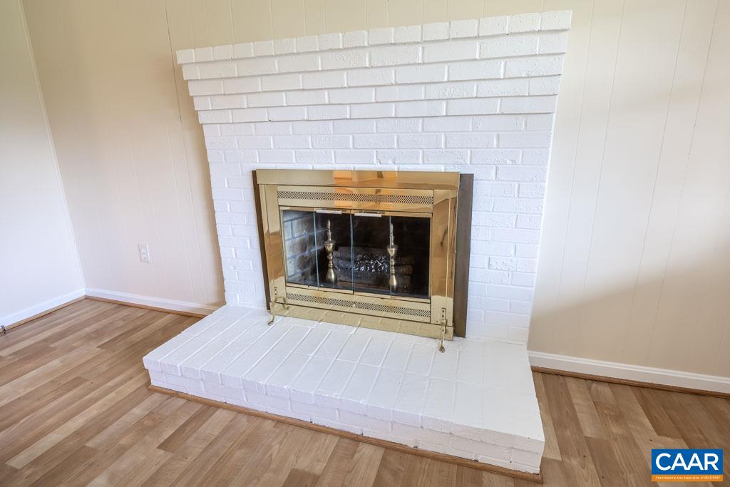 144 Dairy Road Ruckersville, VA 22968 - Photo 27 of 33 a view of fireplace and wooden floor