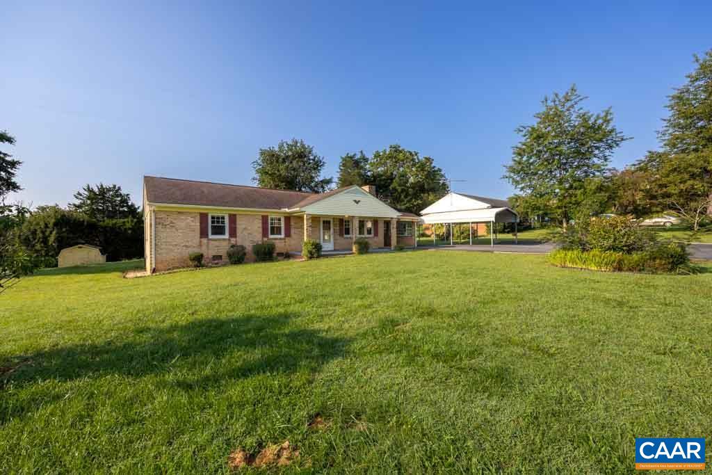 144 Dairy Road Ruckersville, VA 22968 - Photo 3 of 33 a front view of house with yard and green space