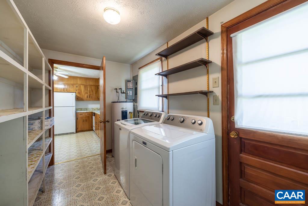 144 Dairy Road Ruckersville, VA 22968 - Photo 33 of 33 a utility room with dryer and washer