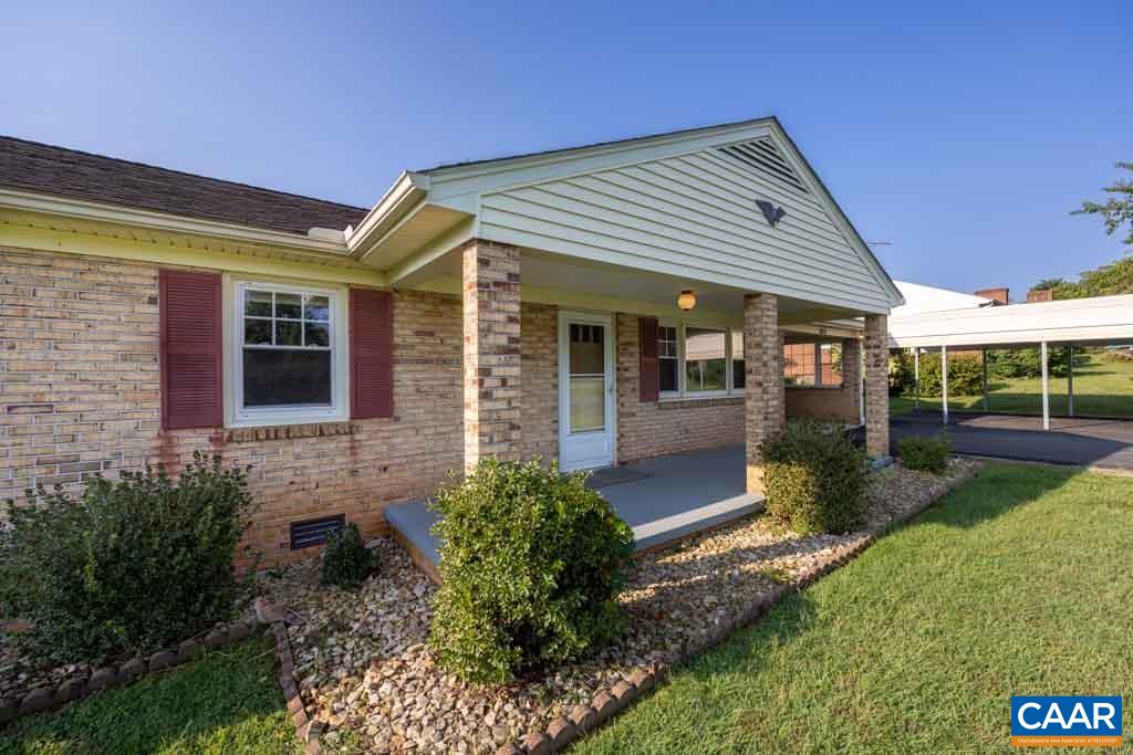 144 Dairy Road Ruckersville, VA 22968 - Photo 4 of 33 a front view of a house with garden