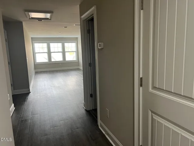 an aerial view of a house with swimming pool