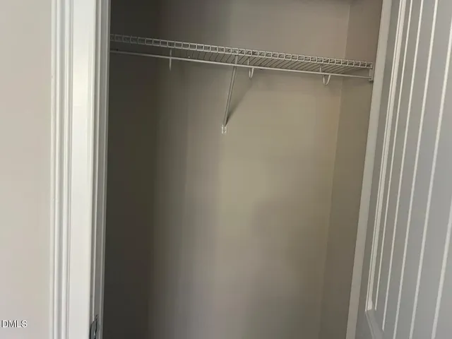 a white toilet and tub sitting next to a bathroom sink