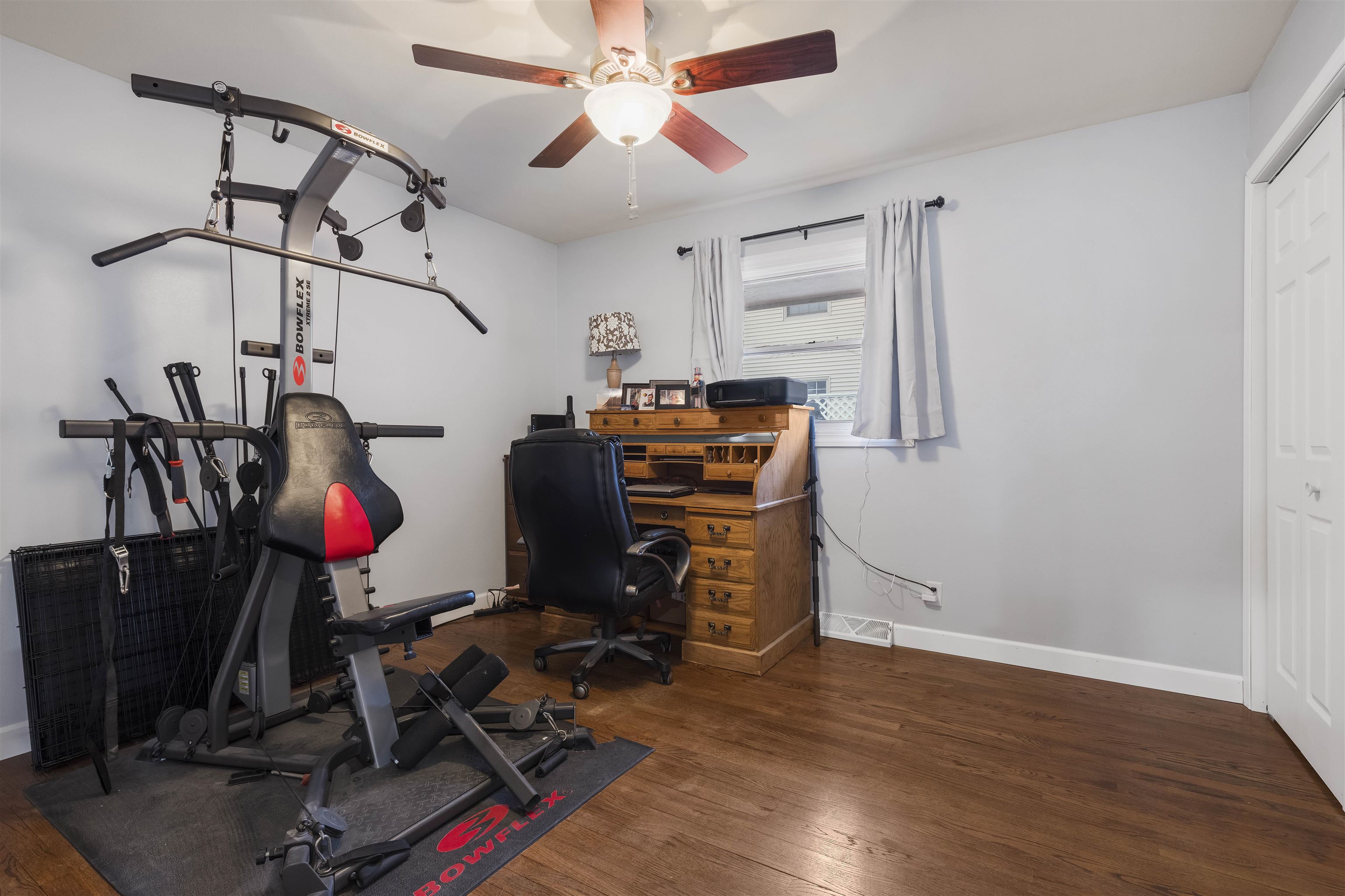 4711 Brookview Road Rockford, IL 61107 - Photo 12 of 26 a view of a room with gym equipment