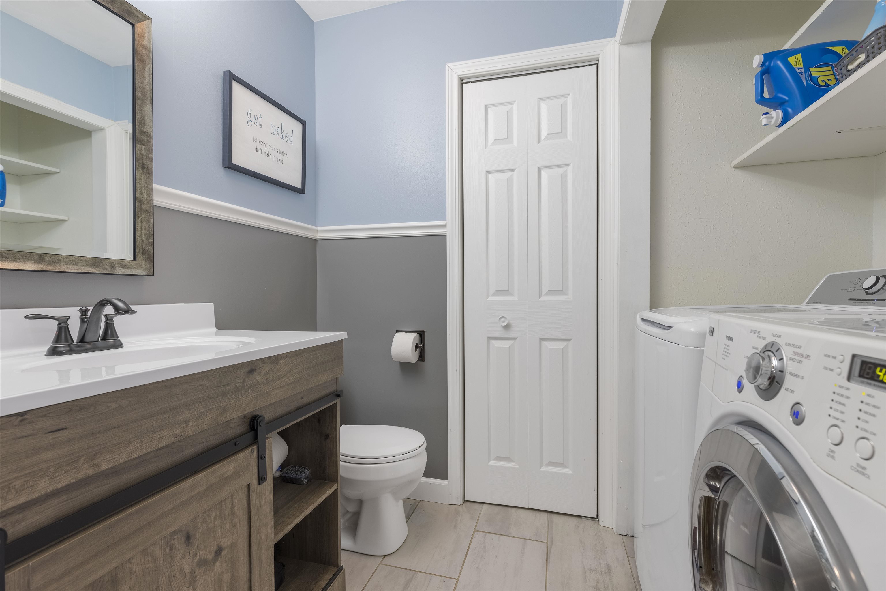 4711 Brookview Road Rockford, IL 61107 - Photo 13 of 26 a view of bathroom with a washer and dryer