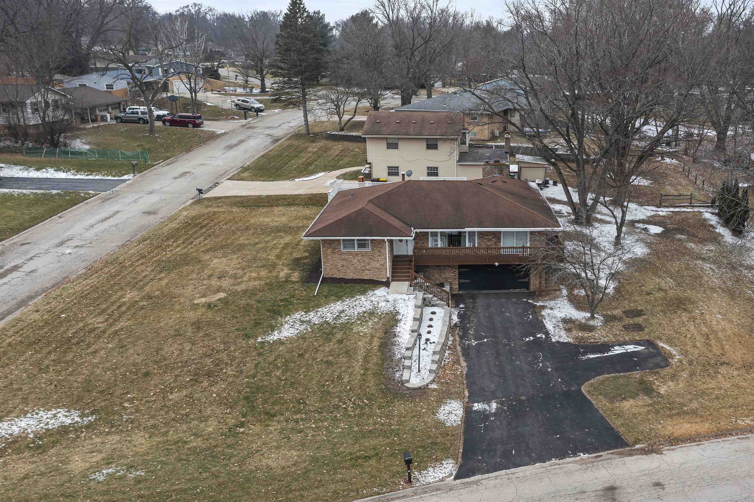 4711 Brookview Road Rockford, IL 61107 - Photo 22 of 26 a view of a town with large trees