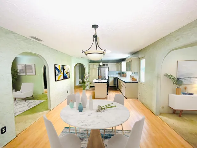 a living room with dining table