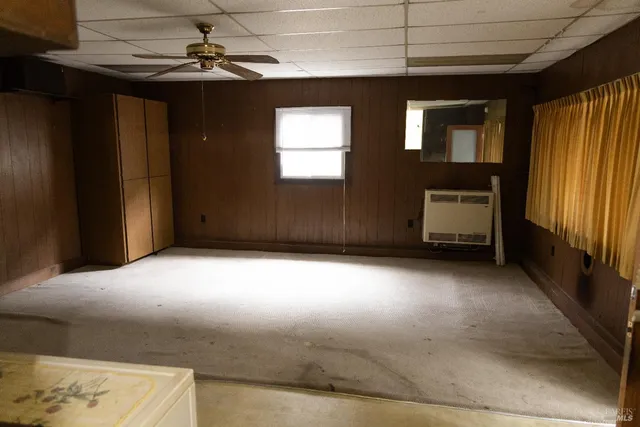 a view of empty room with windows