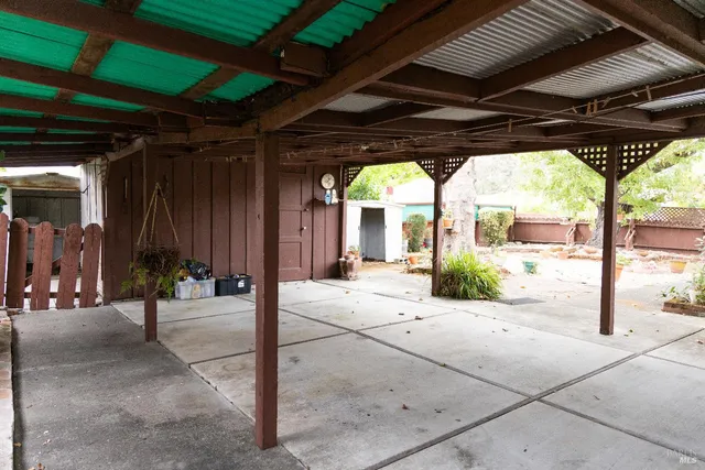 a view of a porch with furniture