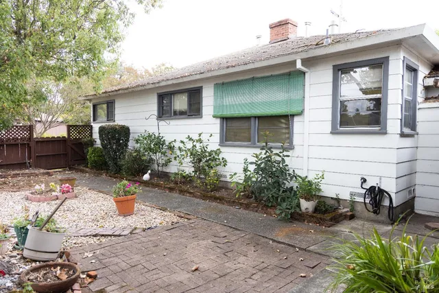 a front view of a house with patio