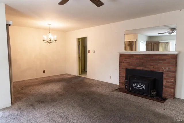 a view of a livingroom with a fireplace