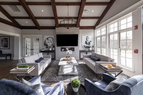 a view of a water heater room with a ceiling fan