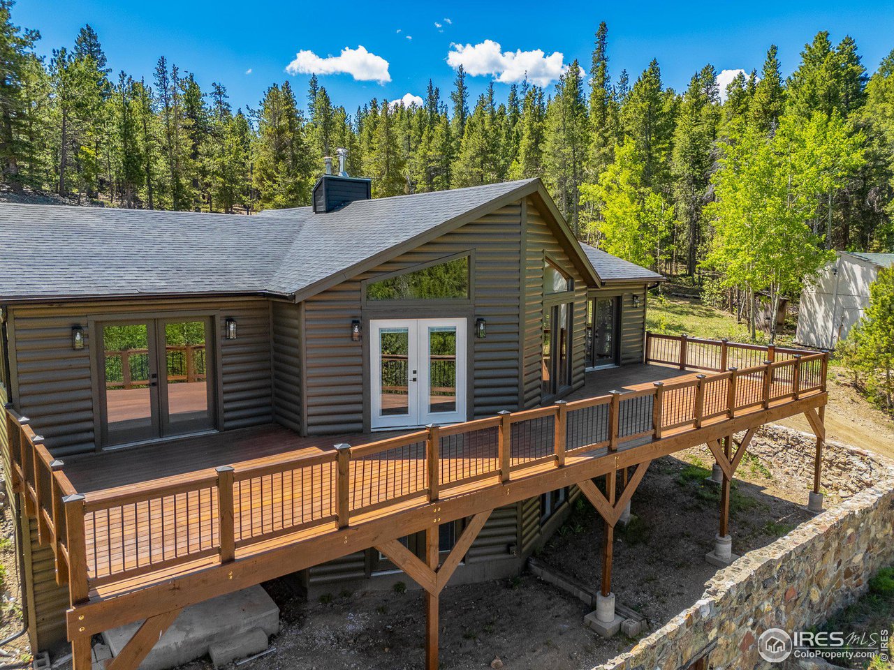 102 Raster Road Black Hawk, CO 80422 - Photo 3 of 40 New deck, railings & posts + a new roof