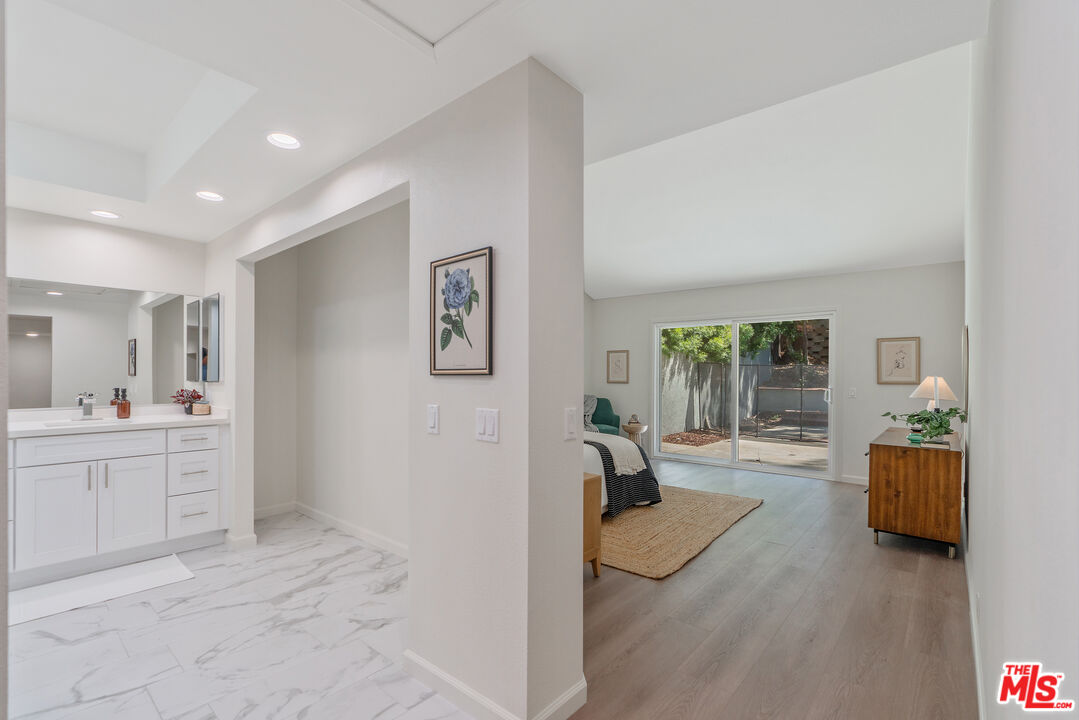 19 Rippling Streme Irvine, CA 92603 - Photo 33 of 69 a living room with furniture and a large window