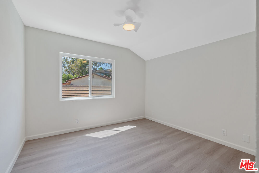 19 Rippling Streme Irvine, CA 92603 - Photo 40 of 69 wooden floor in an empty room with a window