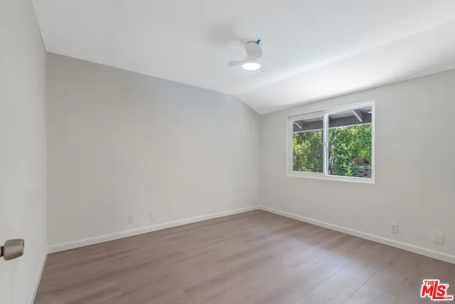 a view of a backyard with a small cabin