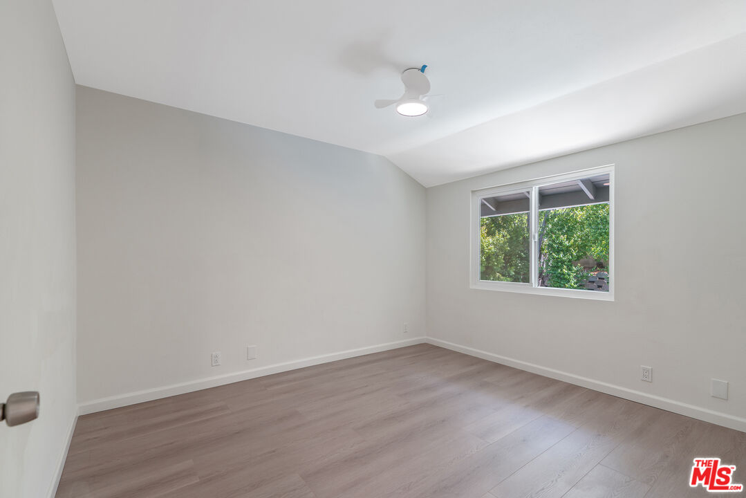 19 Rippling Streme Irvine, CA 92603 - Photo 43 of 69 wooden floor in an empty room with a window