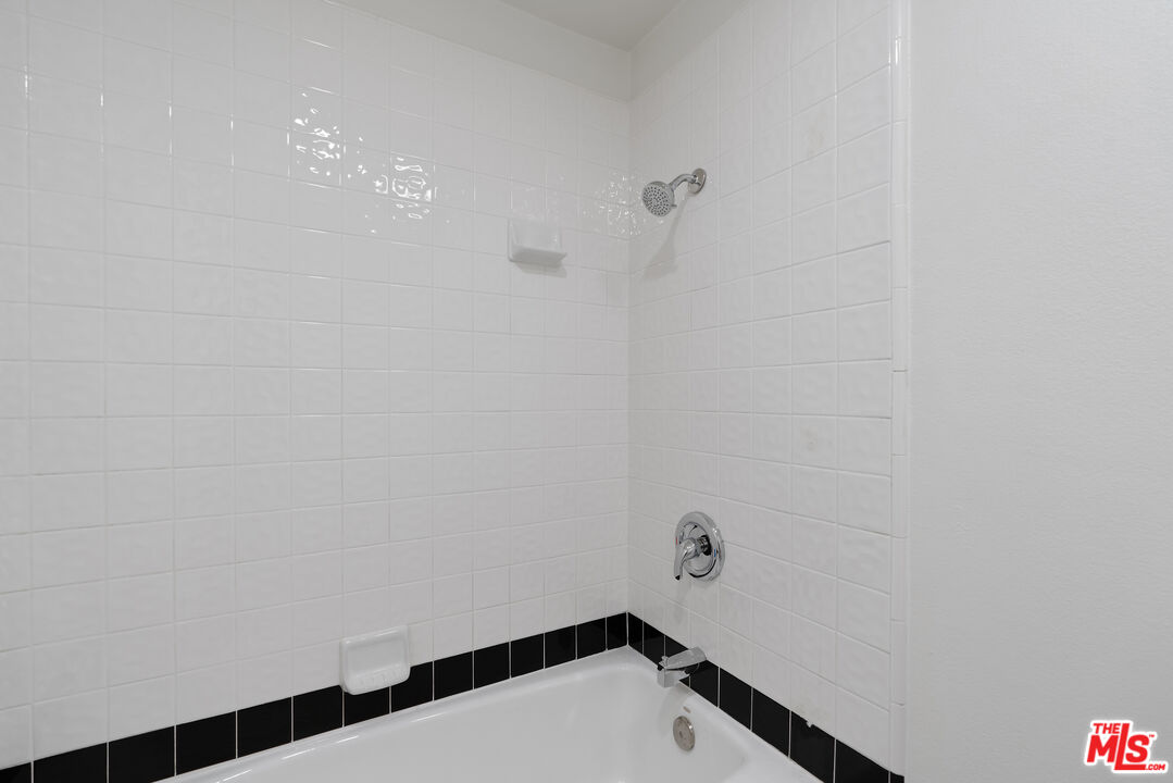 19 Rippling Streme Irvine, CA 92603 - Photo 45 of 69 a bathroom with a window and a shower