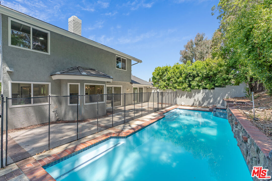 19 Rippling Streme Irvine, CA 92603 - Photo 52 of 69 a view of a house with a backyard
