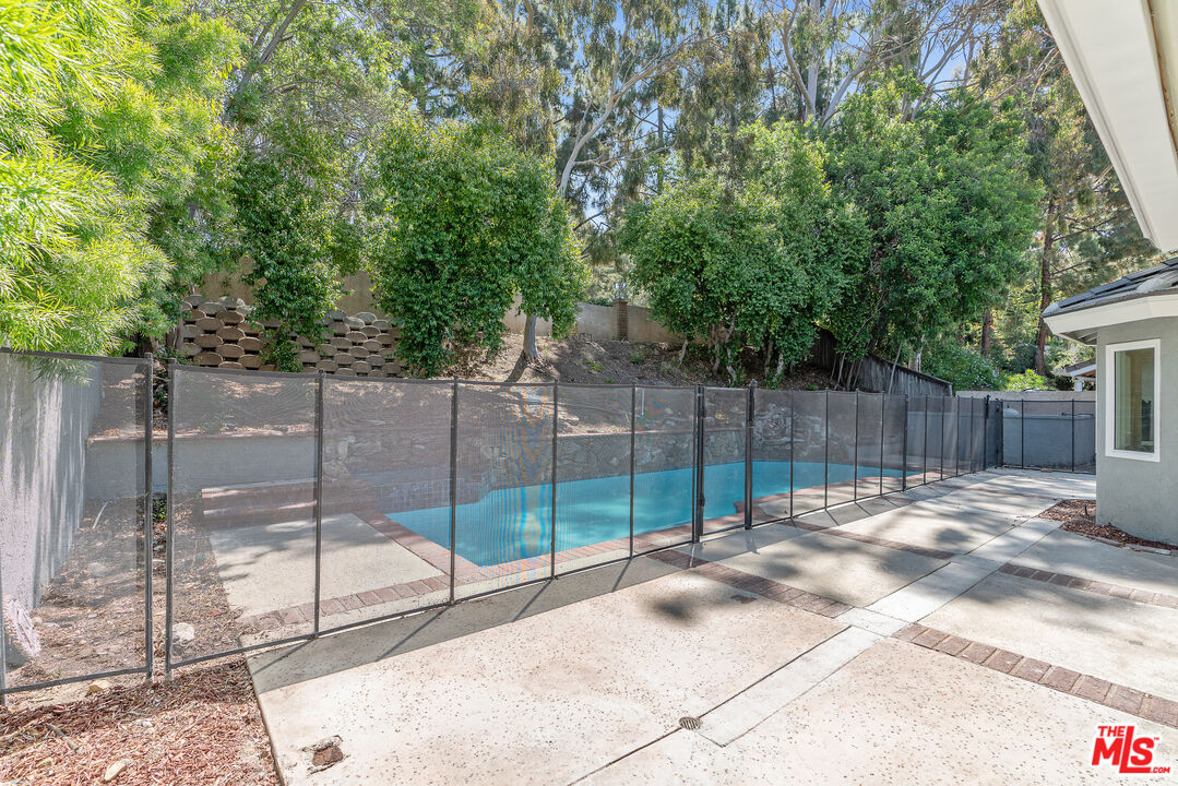 19 Rippling Streme Irvine, CA 92603 - Photo 58 of 69 a view of backyard with wooden fence