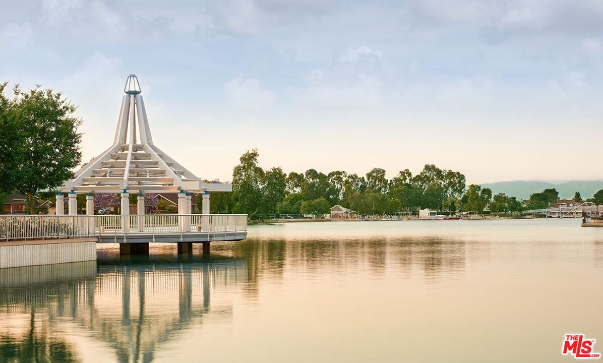 19 Rippling Streme Irvine, CA 92603 - Photo 64 of 69 a view of a house with a lake view