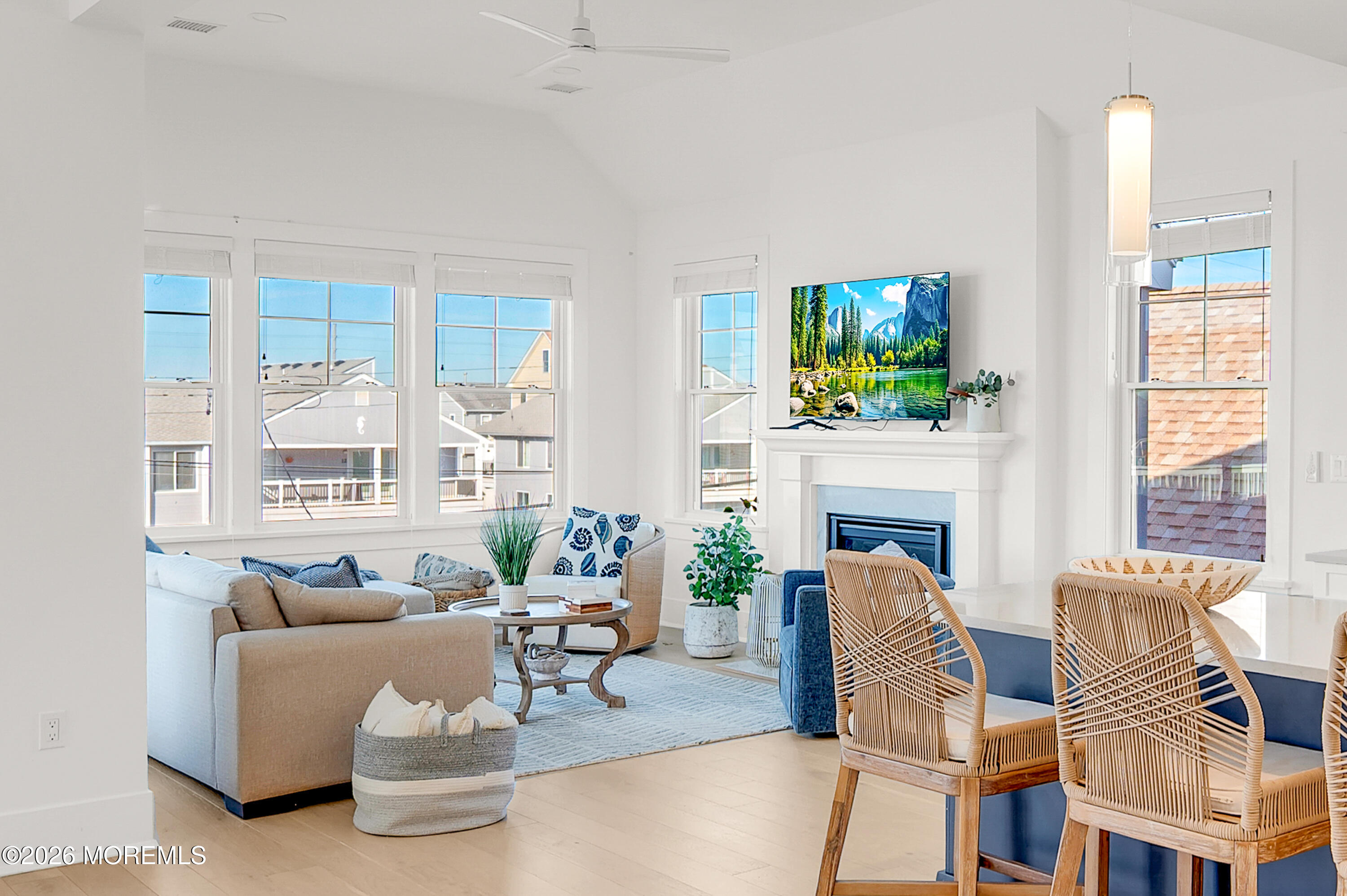 2000 Highway 35 Seaside Heights, NJ 08751 - Photo 14 of 55 a living room with furniture a fireplace and a potted plant