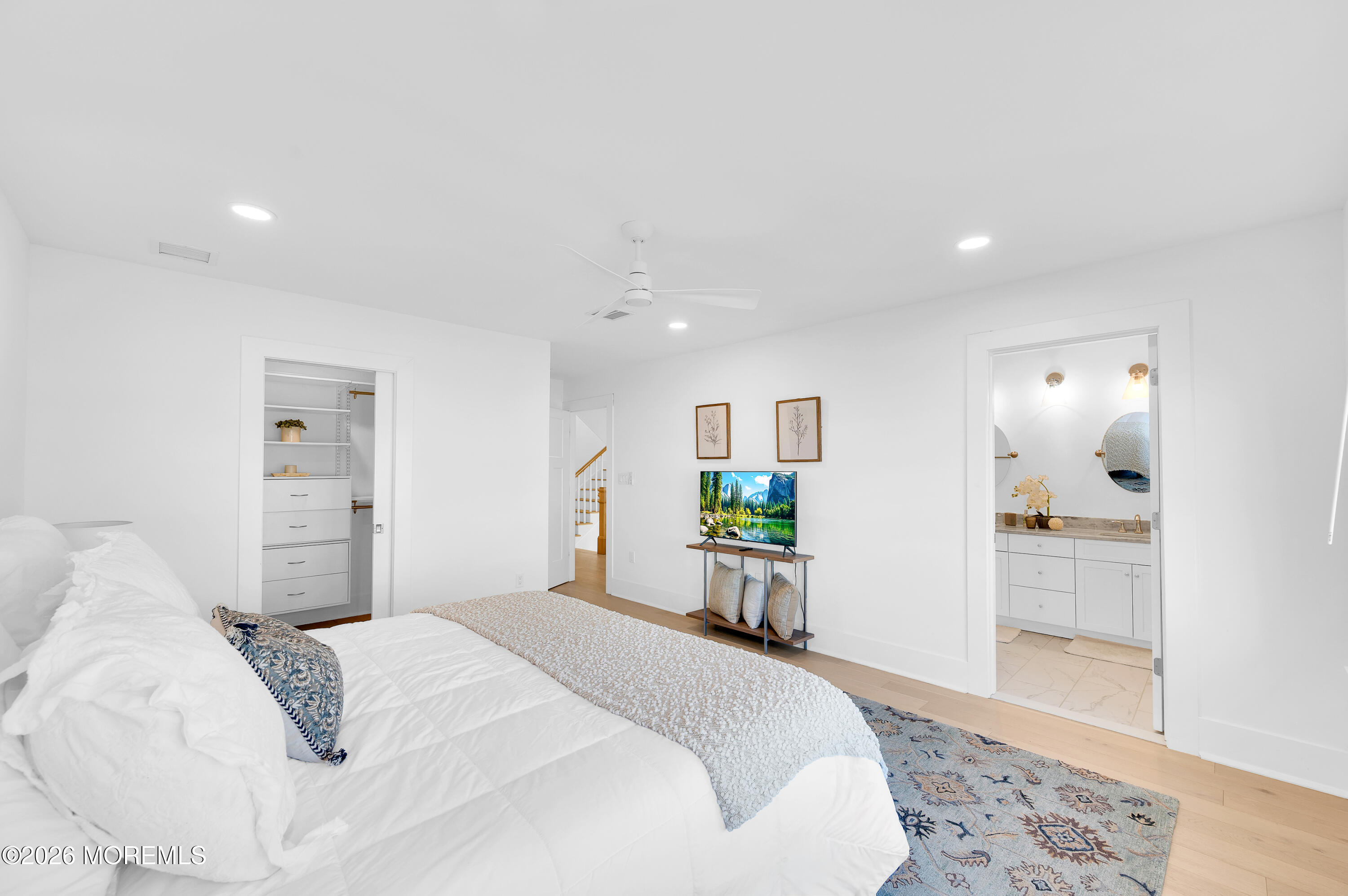 2000 Highway 35 Seaside Heights, NJ 08751 - Photo 26 of 55 a bedroom with a large bed and a dresser